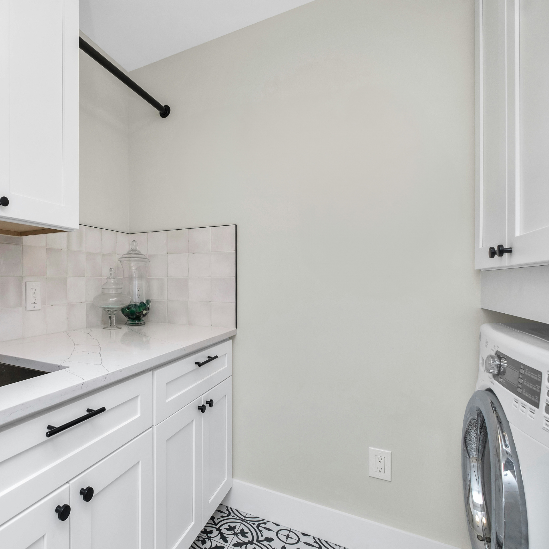 Small bathroom with laundry room